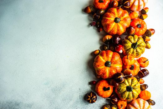 Autumnal frame concept with pumpkins