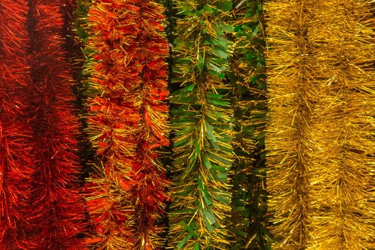 Christmas bright colored tinsel decor and christmas background decorations