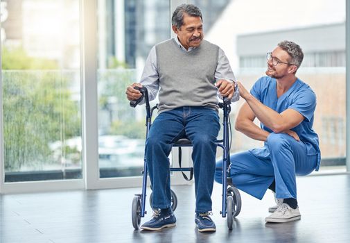 The right support makes a big difference to recovery. a nurse helping a senior man with a walker.