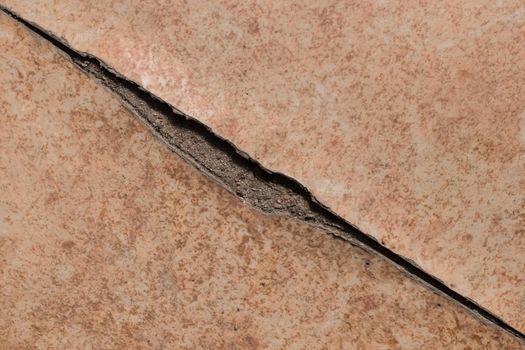 Broken torn linoleum old rubber polymer PVC floor damage material, flooring repair