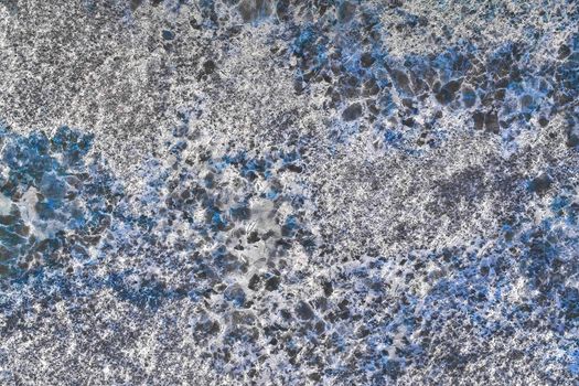 Detailed texture of stone granite or old marble with blue abstract wall pattern texture background.