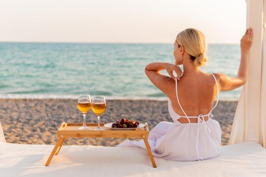 Girl wine tray rest restaurant sea two copyspace summer day, for drink glass for ocean from blue water, sky food. Coast sunset luxury,