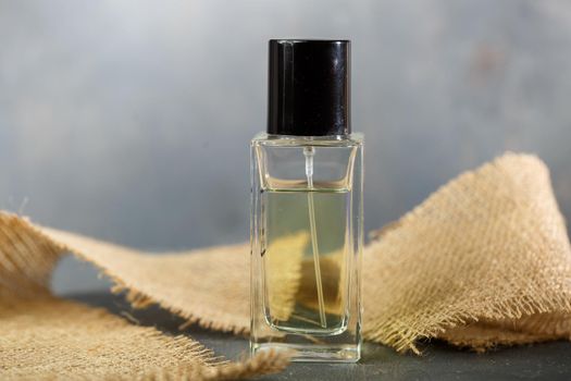 perfume bottle with black cap. Nice smell for women