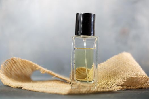 perfume bottle with black cap. Nice smell for women
