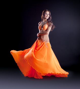 beauty woman dance in traditional arabian costume