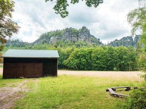 Shelter at meadow close to Schrammsteine and landscape in Saxon Switzerland 
