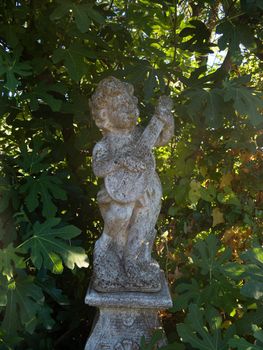ornamental statue in the garden in summer