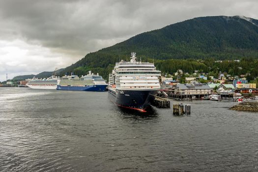 Three cruise ships in the rain at Ketchikan Alaska