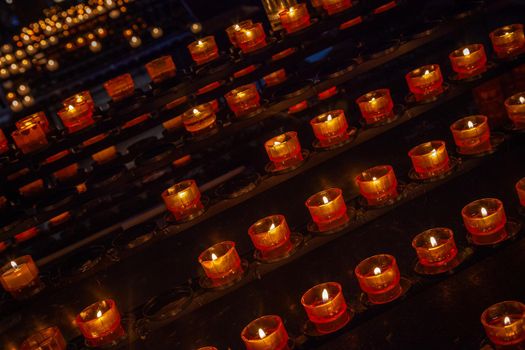 Light candles burning inside Notre Dame Cathedral in Strasbourg, France