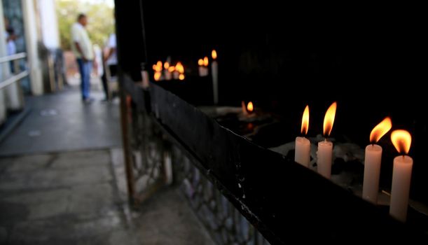 candles burning in bonfim church