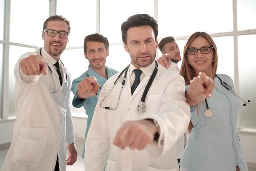 group of doctors and doctors pointing at you