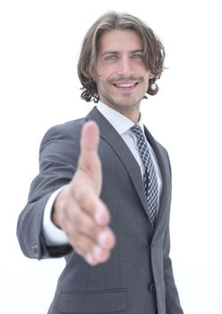 Smiling friendly businessman offers a handshake