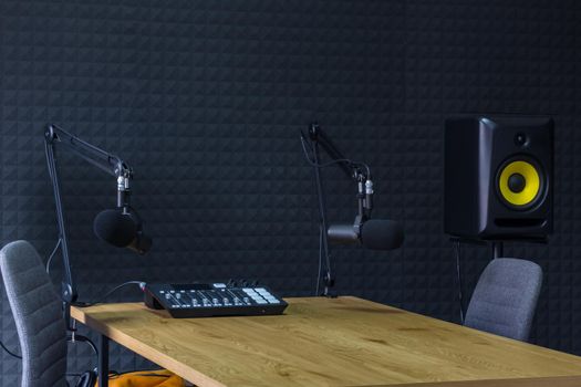 Podcast recording studio, with microphones and equalizer for recording online radio broadcasts