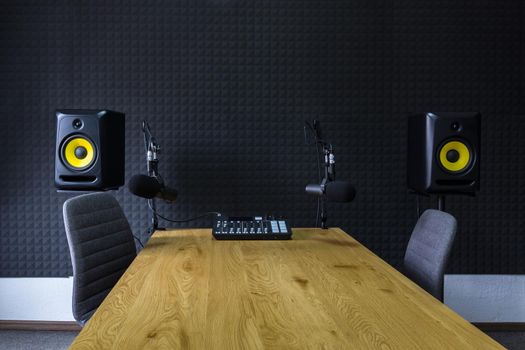 Podcast recording studio, with microphones and equalizer for recording online radio broadcasts
