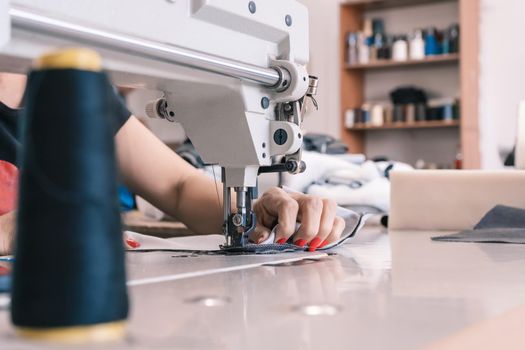 Seamstress at the sewing machine