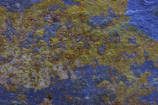Abstract wall background with blue yellow spots.
