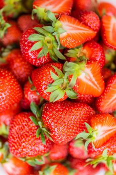 Fresh ripe delicious strawberries in bowl - healthy food and vegetarian