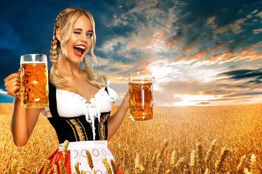 Young sexy oktoberfest girl waitress, wearing a traditional Bavarian or german dirndl, serving big beer mugs with drink outdoor.