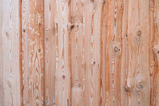 Wooden barn wall made of boards in russian village.