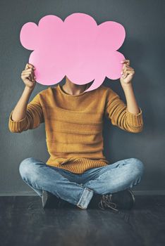 Woman holding thought bubble, chat or speech board for voicing opinions, chatting on social media or sharing ideas. Creative thinking of marketing strategy, planning or innovating vision for business