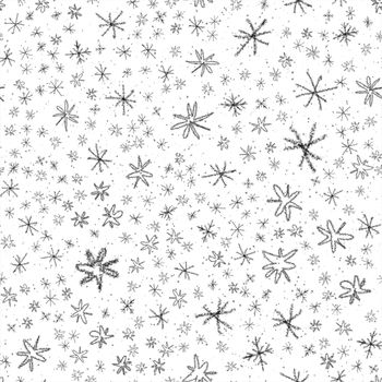 Hand Drawn Snowflakes Christmas Seamless Pattern. Subtle Flying Snow Flakes on chalk snowflakes Background. Amusing chalk handdrawn snow overlay. Appealing holiday season decoration.