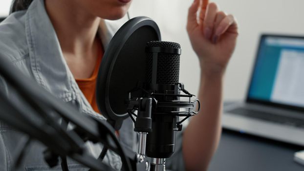 Internet live radio talk show host recording remote podcast while talking to audience