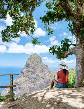 Women hiking in Saint Lucia Caribbean, nature trail in the jungle of Saint Lucia huge Pitons