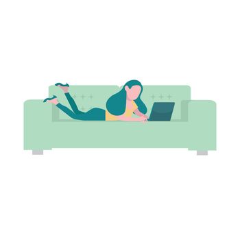 woman using laptop on sofa