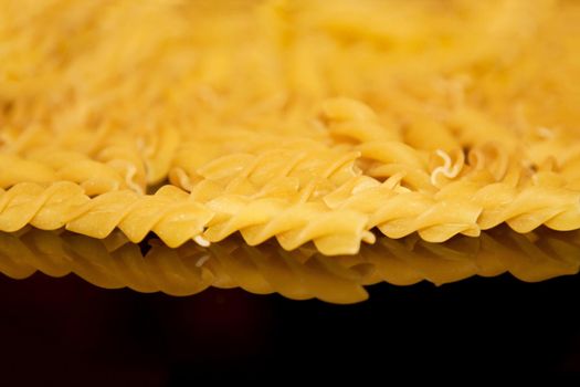 raw macaroni - pasta and italian cuisine recipes styled concept