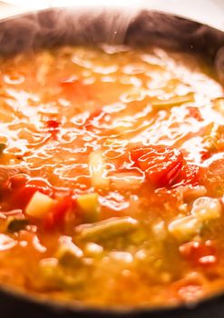 Cooking vegetable soup in saucepan, comfort food and homemade meal