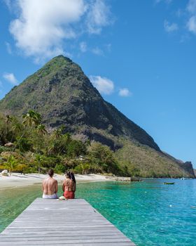 Young couple men and women vacation Saint Lucia, luxury holiday Saint Lucia Caribbean, Sugar beach
