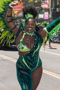 Performers dancing during the 44th Annual Carnaval parade in San Francisco, CA.