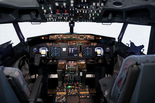 No people in airplane cockpit used by captain and copilot to fly