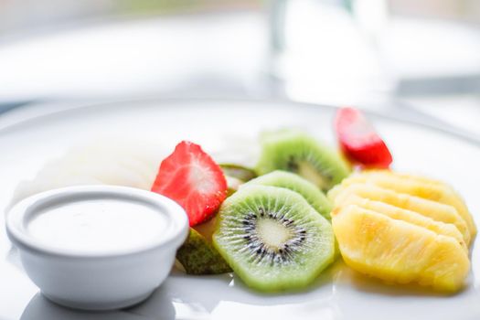 fruit plate served - fresh fruits and healthy eating styled concept