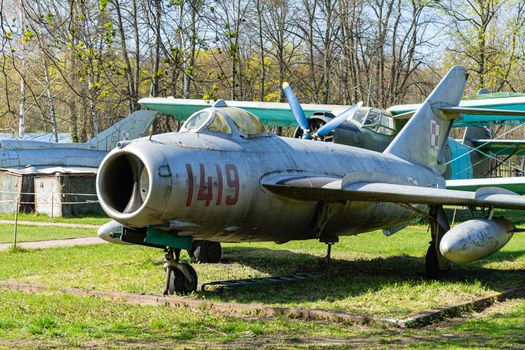 decommissioned MiG-17 at the site for inspection