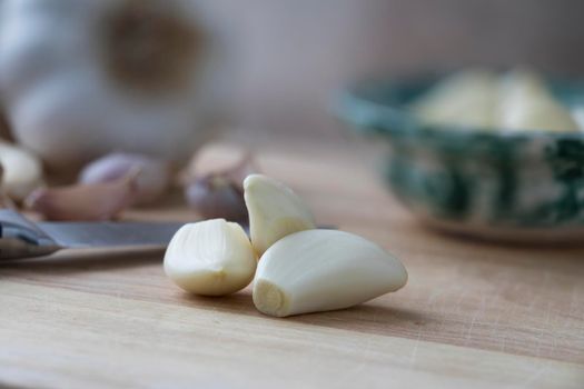 Garlic Cloves on Cutting Surface
