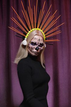 Halloween Make-Up Style, Fancy Dress and Diadem. Blond Model Wear Sugar Skull Makeup with Crown. Santa Muerte concept
