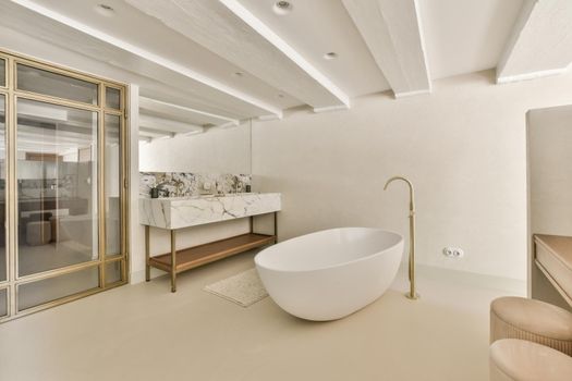 Modern restroom with beige walls