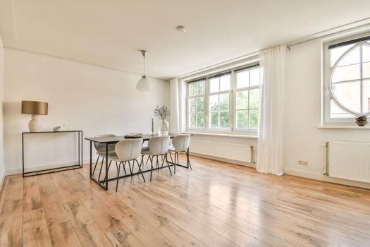 Studio apartment interior with wooden furniture