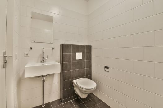 Modern restroom with beige walls