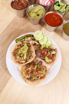 Mexican taco with salsa and a variety of toppings