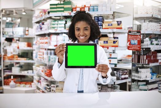 Just ask one of our staff members online. Cropped portrait of an attractive young female pharmacist holding up a tablet with a chromakey screen.