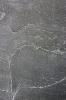 Wall surface with gray rough plaster.