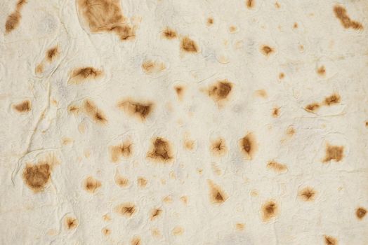 Texture of baked pita bread, top view