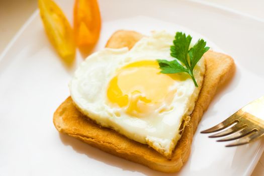 heart shaped fried egg for breakfast
