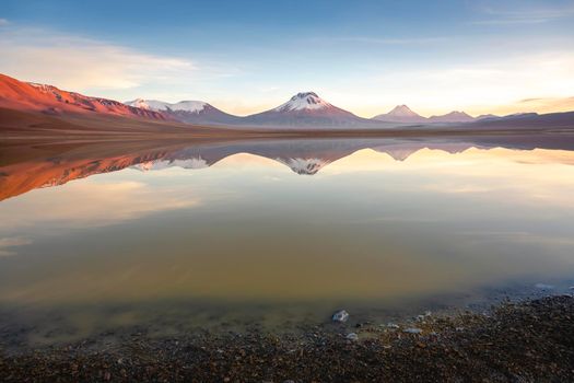 Idyllic Lake Lejia reflection and volcanic landscape in Atacama desert, Chile