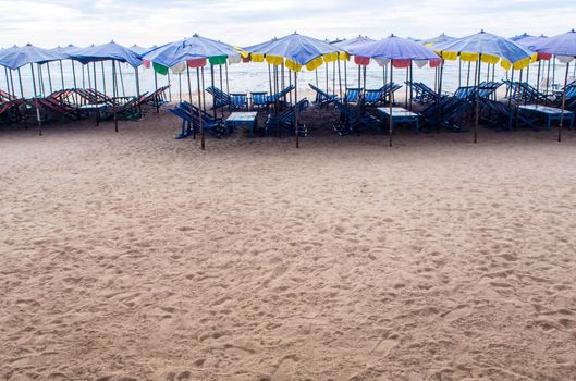 Beach umbrella crowded along the beach