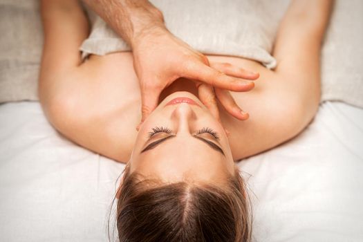Chin or neck massage of woman