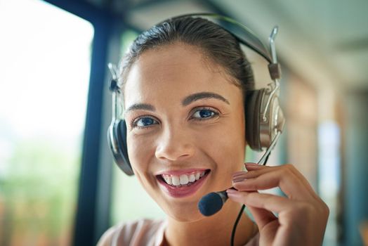 Hello and thank you for calling. a young woman working in a call center.