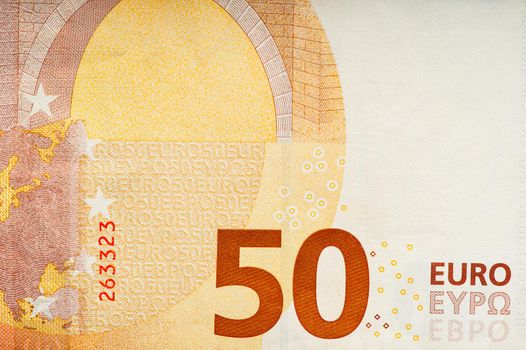 fragment of fifty Euro bill. 50 euro banknote. Euro is the official currency of the European Union